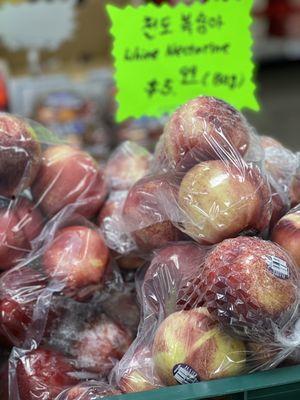 White Nectarines. The owners pre-select and bag them.