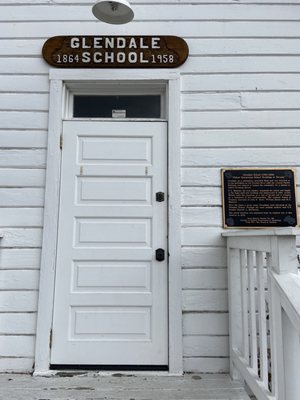 Schoolhouse next to the trains