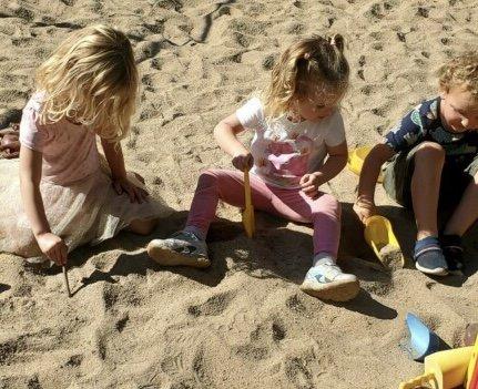 Creative magical sandcastles with friends.