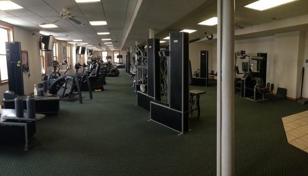 Full fitness center with a variety of workout equipment