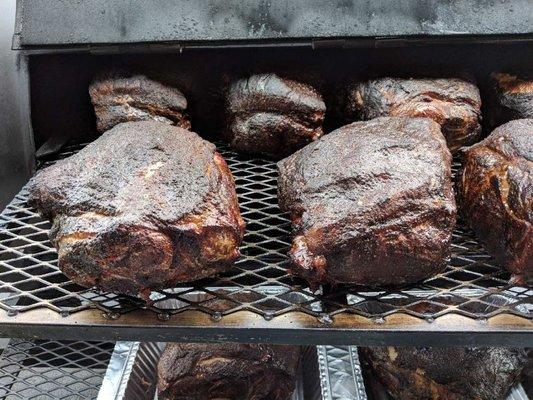 Pork Butts - slow smoked on a reverse flow smoker using only natural hardwoods and no chemicals.