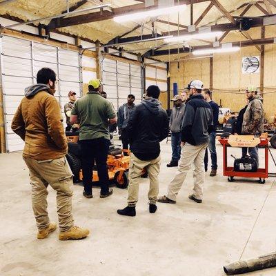 Crew training in the shop.