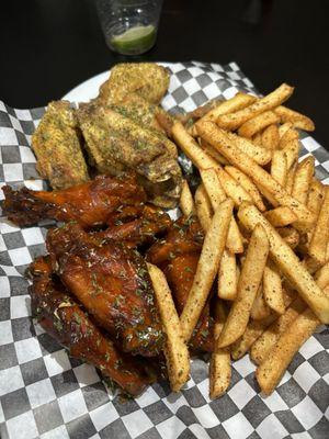 Best wings I've had in a long time ! Lemon pepper and buffalo crispy wings , with Cajun seasoned fries !