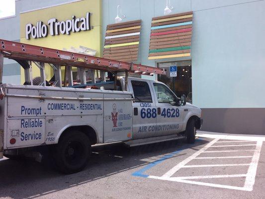 Double parked, hanging out into the parking lot and in a handicap space with no placard permit...