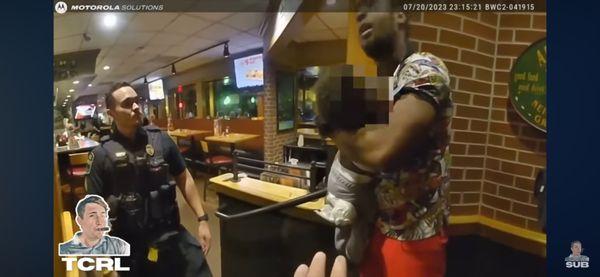 Corrupt violent cops attacking man and baby