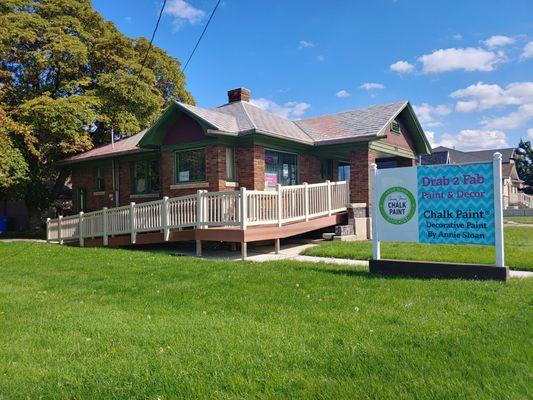 Sign and side of store