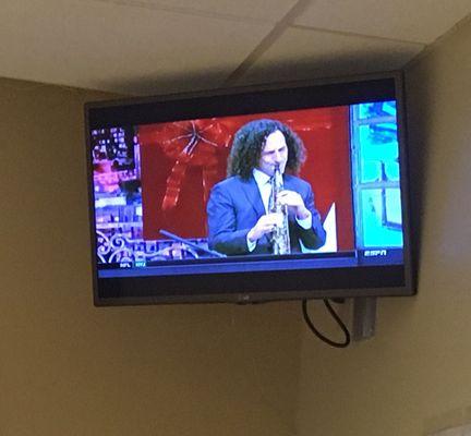 Kenny G. plays on the TVs 24/7.