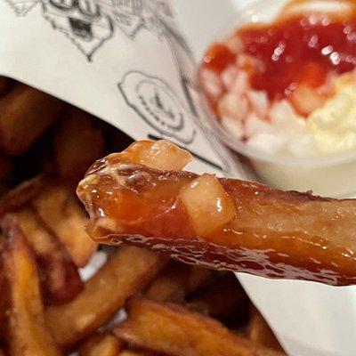 Regular Sized French Fries. $6.50 + tax + tip with some Especial sauce