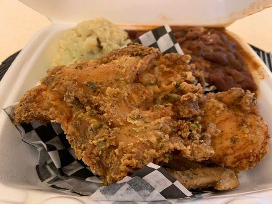 Fried chicken, potato salad and red beans & rice.