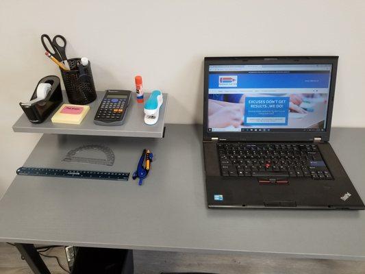 Every desk is equipped with everything a student needs.