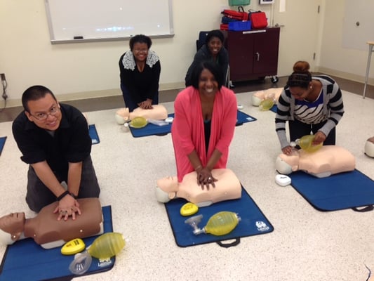 Community Health Workers Learning CPR at The Center for Economic and Workforce Development.