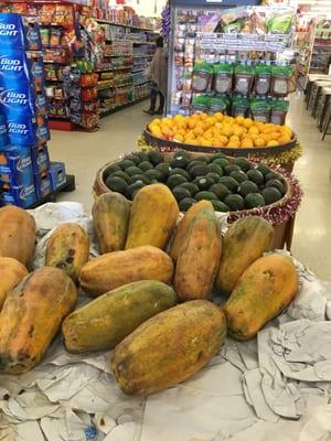 Ripe papaya, avocados, oranges