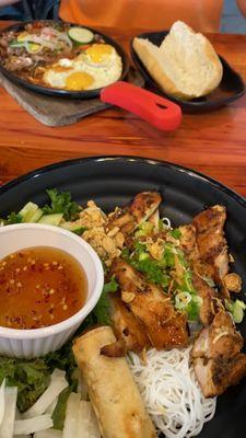 Lemongrass chicken bun (vermicelli bowl) with a tiny egg roll