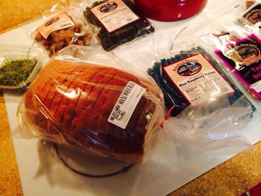 Loot from my (cheap!) treasure hunt at Taste of Amish: wheat loaf, beef jerky x2, candy twists x2, peanuts and honey!