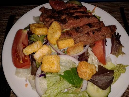 House salad - $7. Add steak - $13.50.