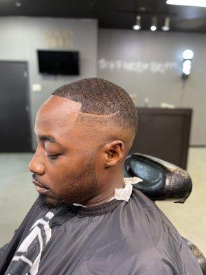 Dark bald fade