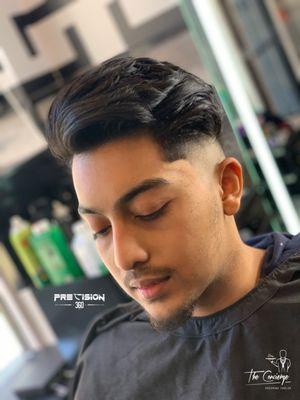 Mid skin fade with feathery textured top.  Cut by 360 IG @precision360  Appointment only link & contact in Instagram bio.