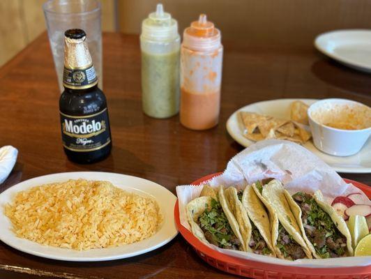 I got tacos with a side of rice and nice cold beer, and the dip I couldn't hold off on