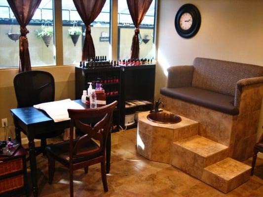 Manicure & pedicure stations overlook the peaceful garden patio.