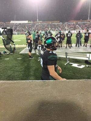 View from sect 108 row 1.  UNCC first home night game in program history! Those black helmets are sweet!