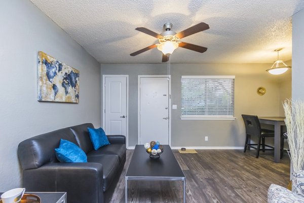 Living room area at Charleston Crossing apartments in Broken Arrow, Oklahoma.