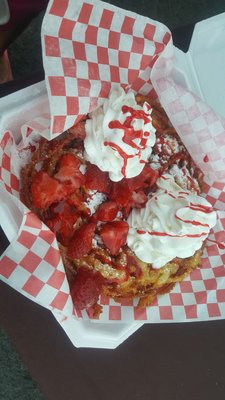 #1 funnel cake with strawberries, drizzle & whip