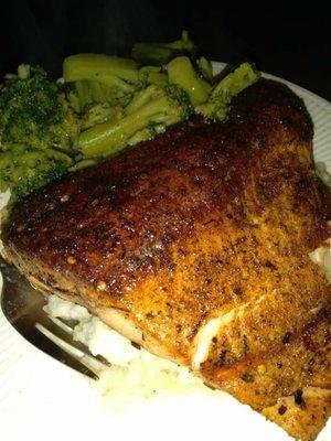 Blackened salmon over garlic parmesan mashed potatoes with steamed broccoli