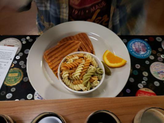 One of the sandwich offerings with pasta side salad