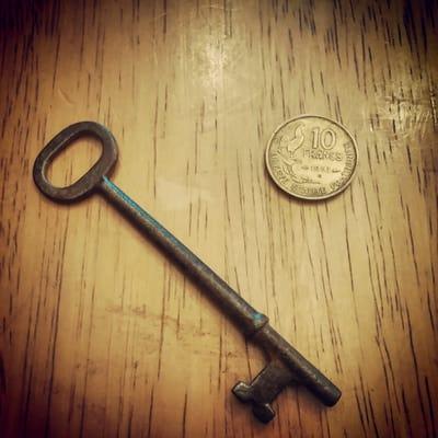 Two of the items I purchased here - a skeleton key nda a french coin from 1950