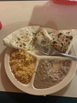 Chicken quesadilla with rice and beans.