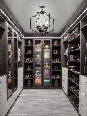 Fully custom closet, floor to ceiling, drawers and doors, custom lighting.