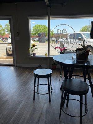 Cute little seating area along with a "bar" with stools as well