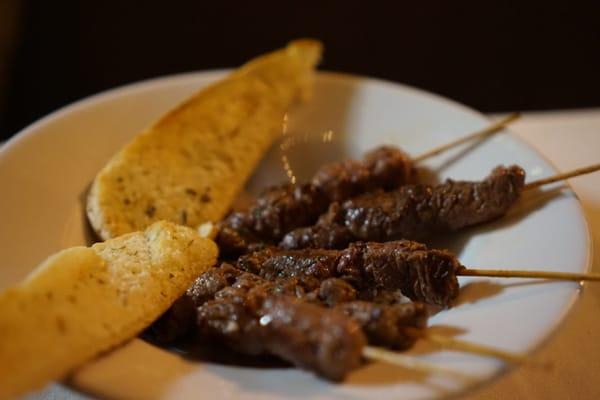 Filet Mignon Skewers, Red Wine Reduction, Garlic Toast