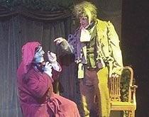 Scrooge cowers before the ghost of Marley in Tri-State's annual production of A CHRISTMAS CAROL. Dec. 8-23 in 2010.