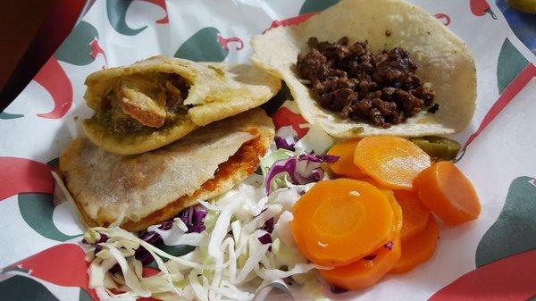 Chicharron and tinga gordita with a steak taco.