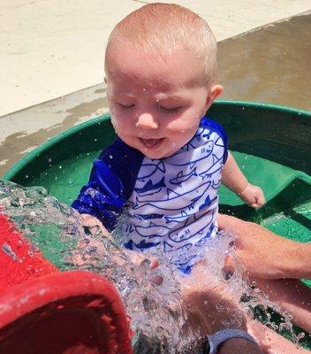 Our 6 month old playing on the splash pad