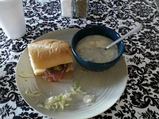 Our budget lunch .soup and half a sandwich.