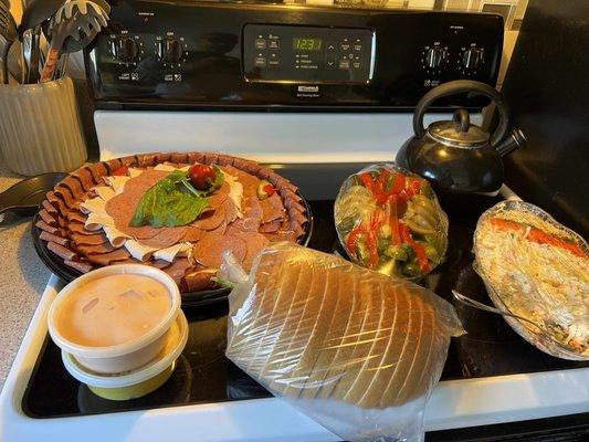 Deli platter for 10 people. Missing from photo a second loaf of rye bread.