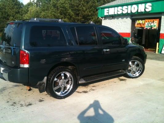 Nissan Armada after wash with tire shine.