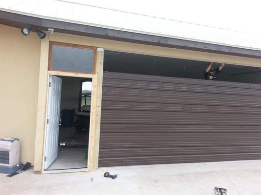 residential ribbed steel brown door