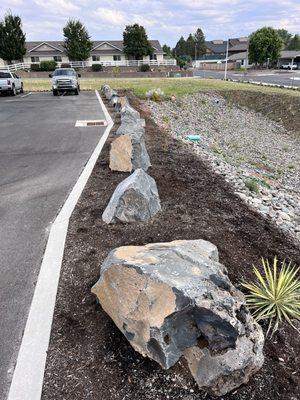 Some beautiful landscape rocks used from Rock N Road quarry products.