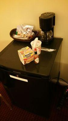 Mini fridge & coffee maker (hot sauce & Instant Ramen not included, lol.)