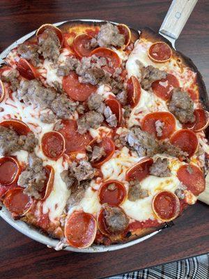 Gluten free Italian sausage and pepperoni pizza.