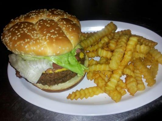 Estilo juarez burger .has ham.hotdog.bacon .mayonaise.tomatoes.lettuce.avacados. Very good. comes with fries