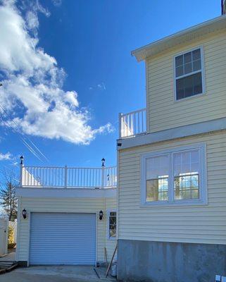 Garage addition + House extension + siding installation