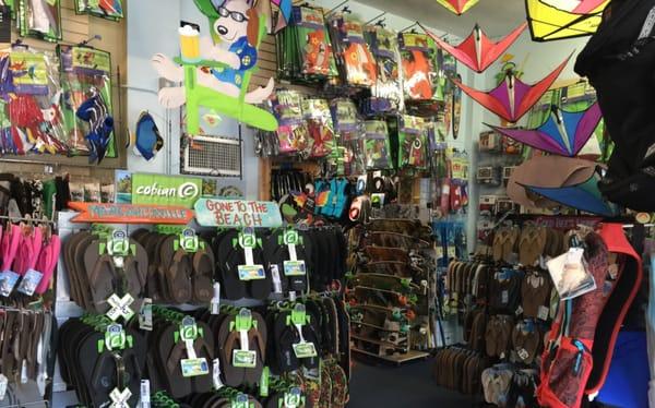 Spinners up top,  Skateboards and flip flops.  Always on Sale at the Kite Shop.