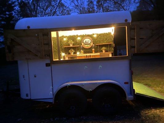 The Wanderer Traveling Bar is the center of attention in the night time.