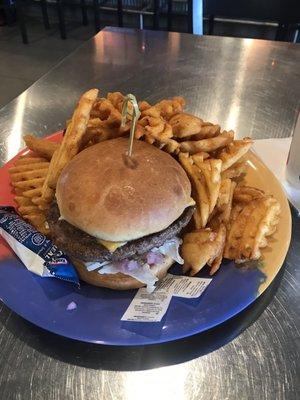 Cheeseburger and waffle fries.