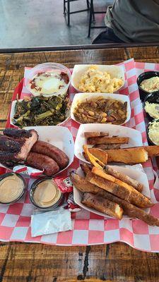 The other half of our spread.  Ribs, sausage, greens, chili, mac n cheese, meaty beans, tater wedges