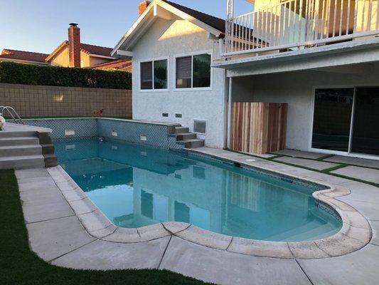 Back yard almost completed. Stucco repair and paint were done. Wood gate put up to conceal the pool equipment. Love it.